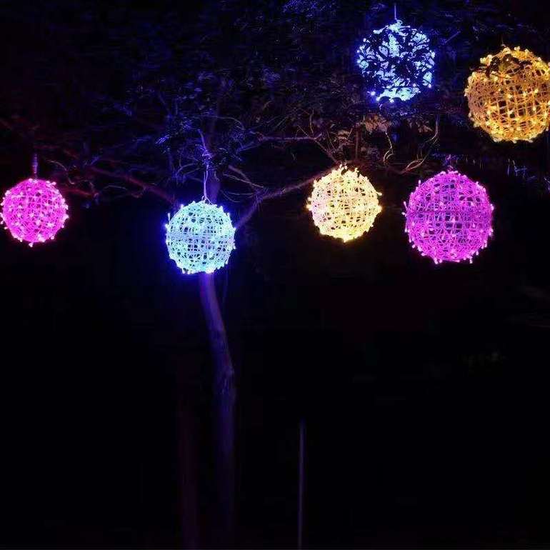 Multicoloured flashing lights streaked with stars and lit rattan bulbs