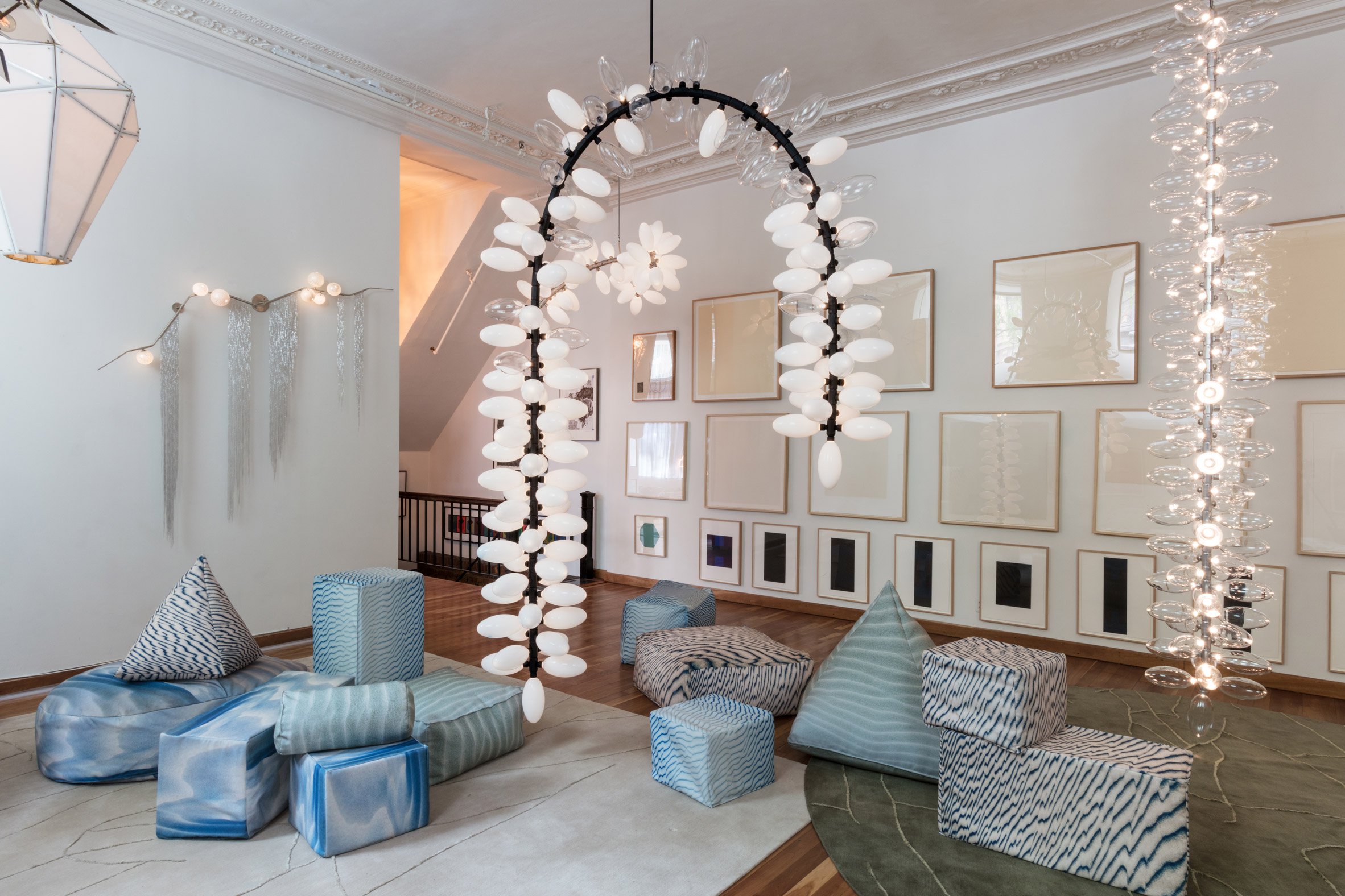 Features Lighting with Cascading Chains and Spine-Like Frames
