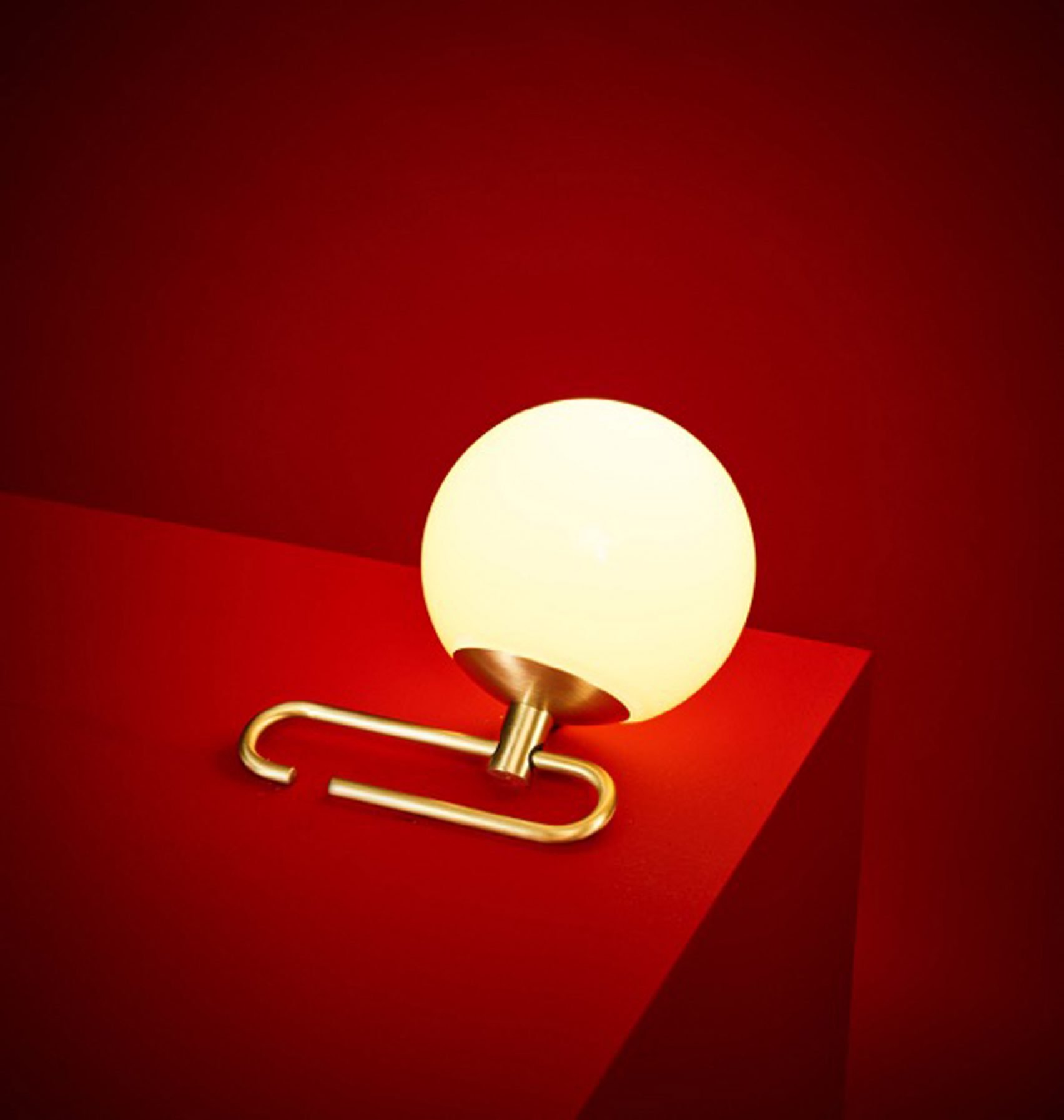 A Lantern-Inspired Lamps that Hang From Adjustable Brass Rings