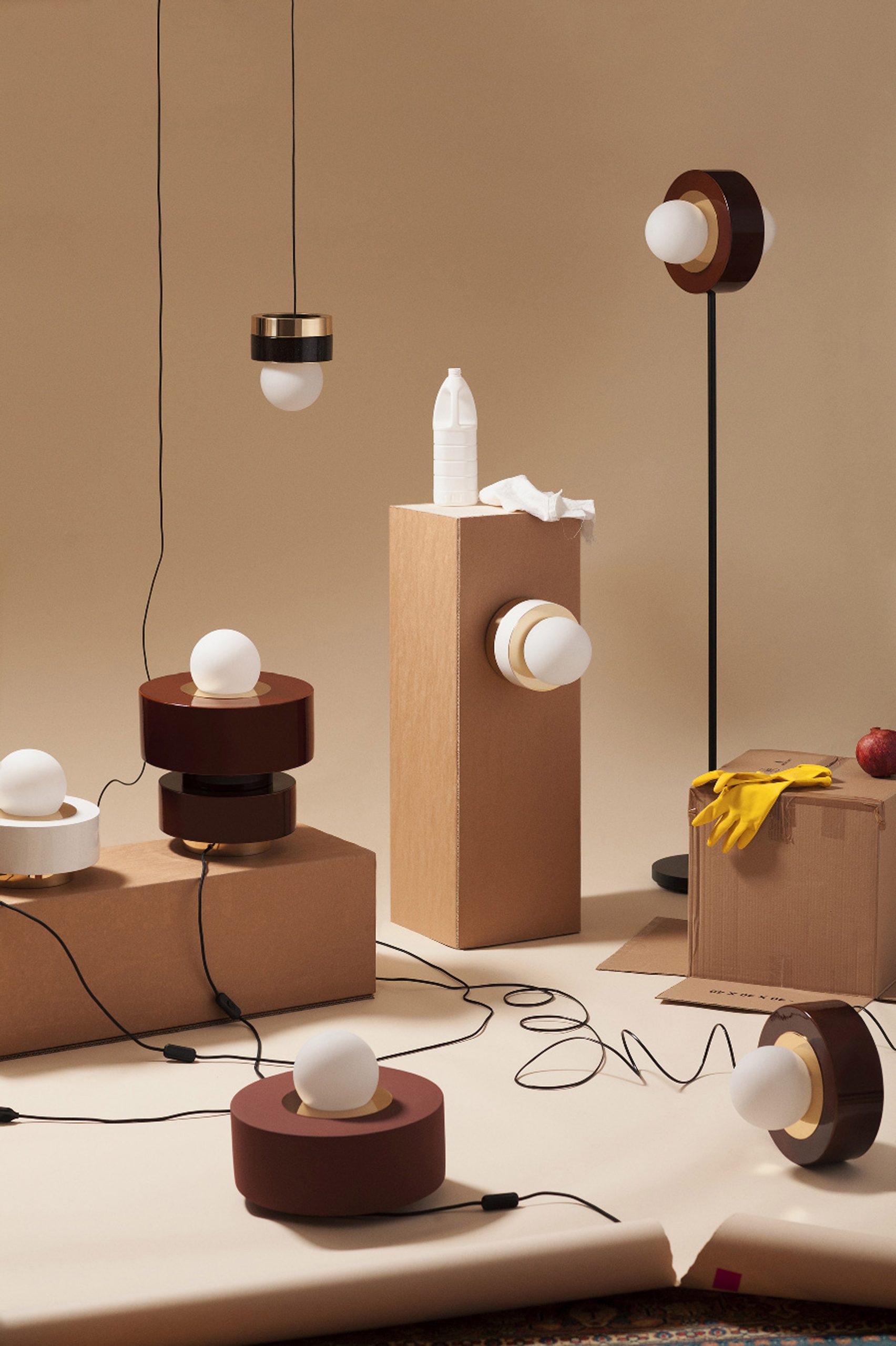 Haos Combines Layers of Wood, Ceramic And Brass to Create Cylindrical Lamps
