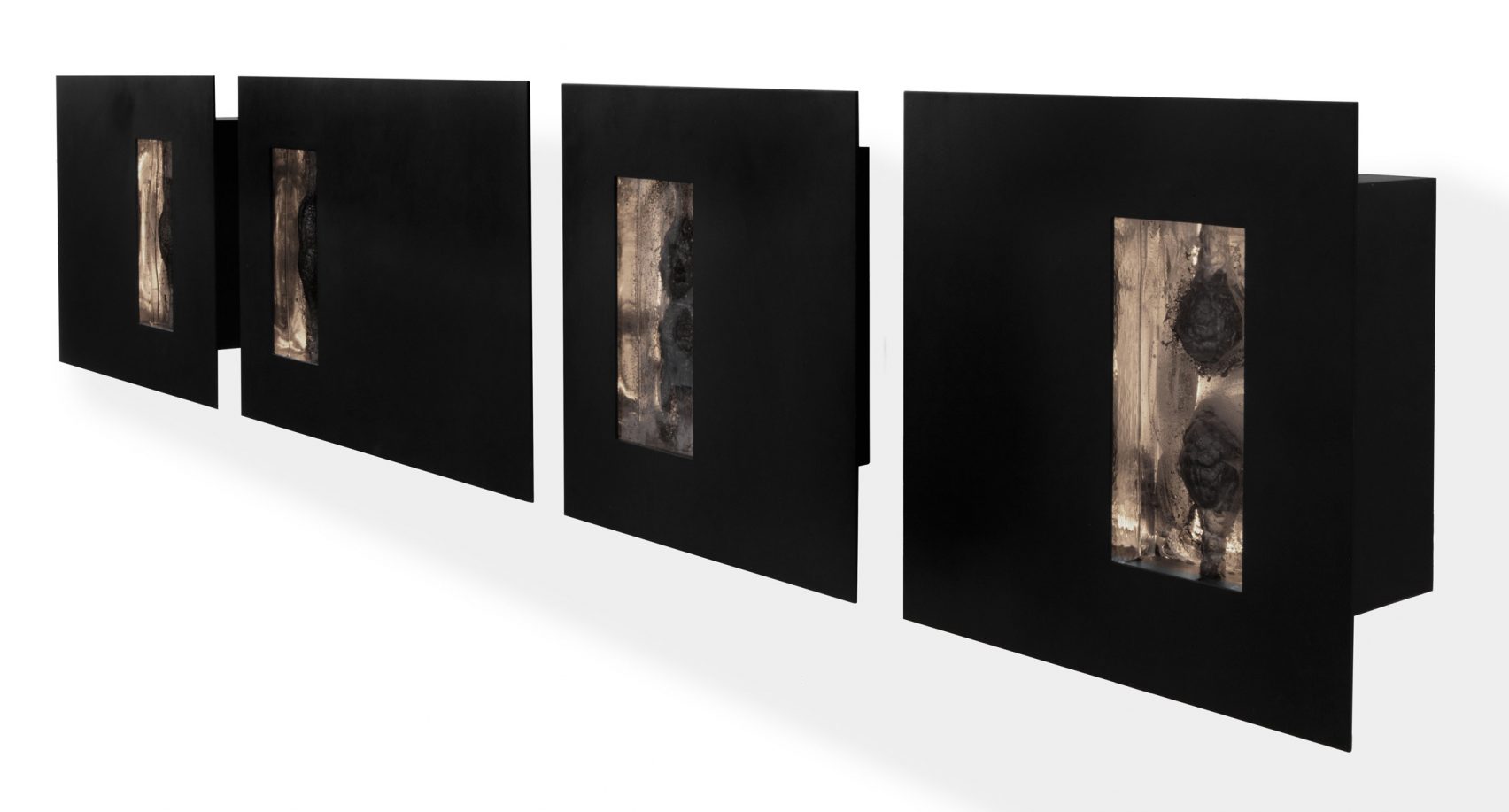 Esrawe Studio Blackens Glass With Burned Wood For Sculptural Lighting Set