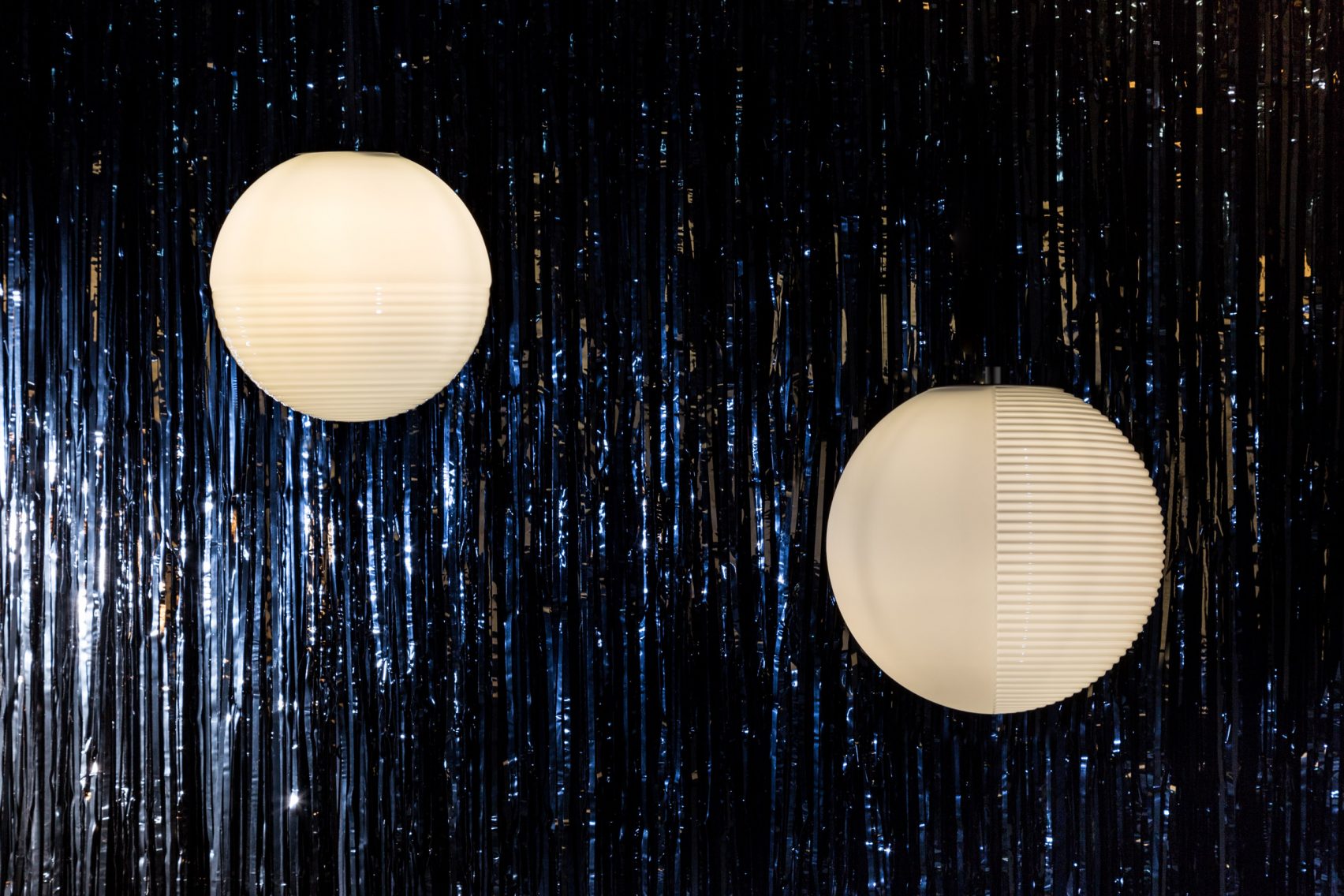 Sebastian Herkner's Stellar Lamps Fuse Two Contrasting Hemispheres