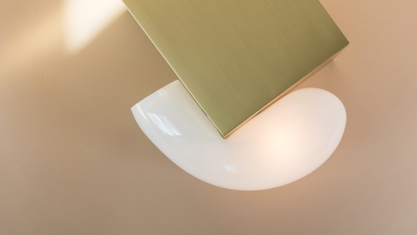 Lindsey Adelman's Catch Lights Ooze Over Brass Bases