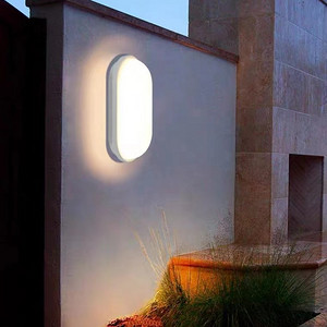 Simple elliptic courtyard wall lamp